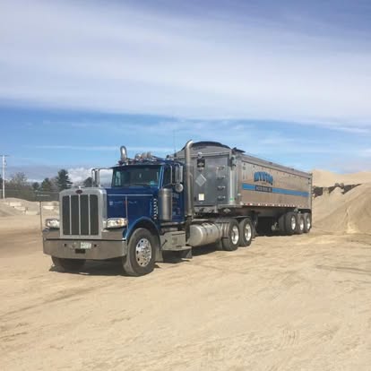 Dump Trailer #20 - Specialized construction dump trailer perfect for site work, material transport, and aggregate delivery throughout the region
