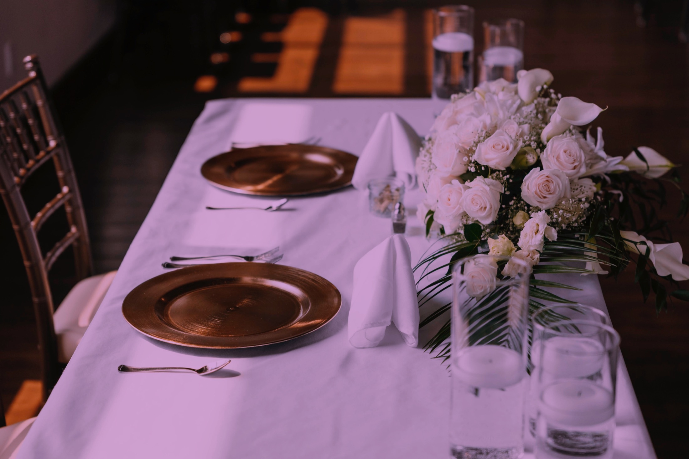 A couple entering their wedding reception